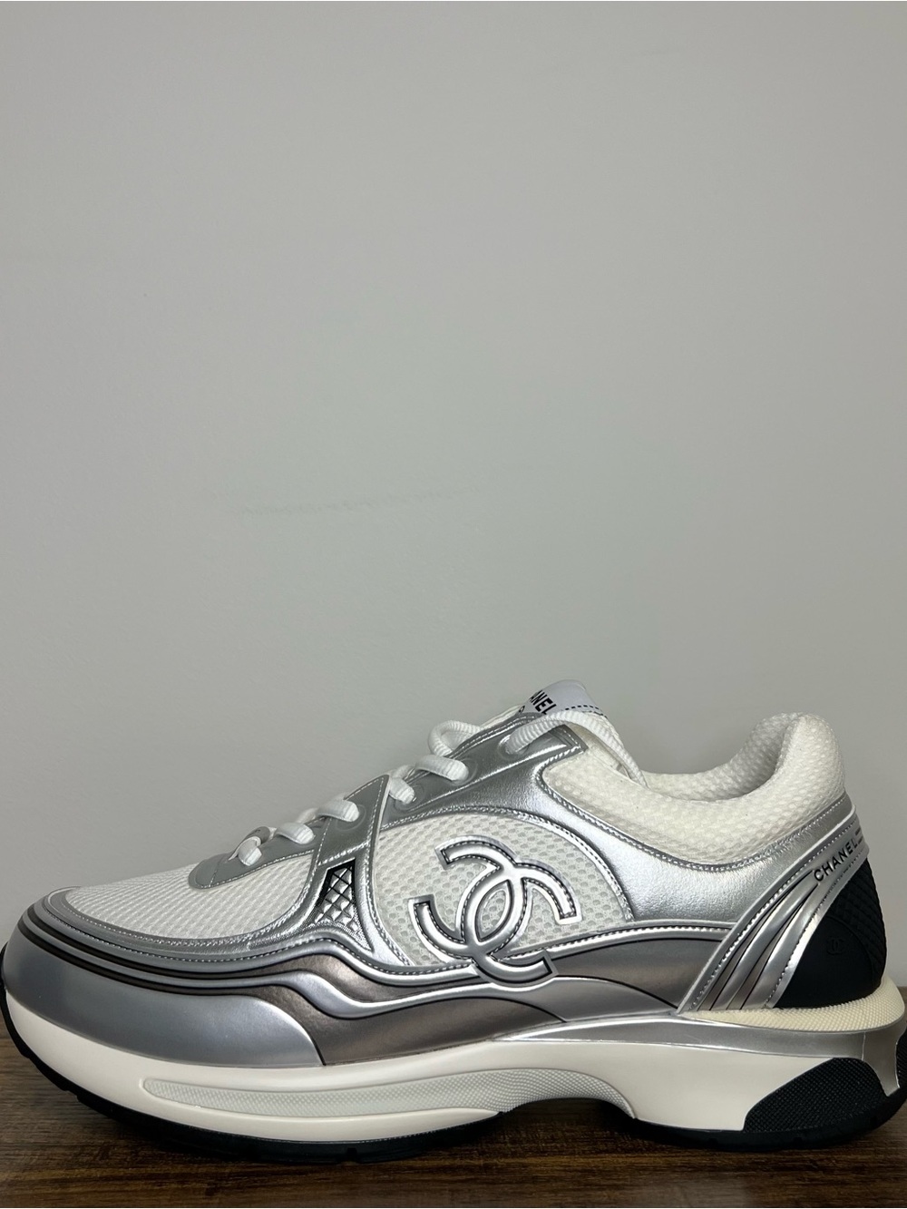 CHANEL Silver and White Interlocking CC Runner Sneaker